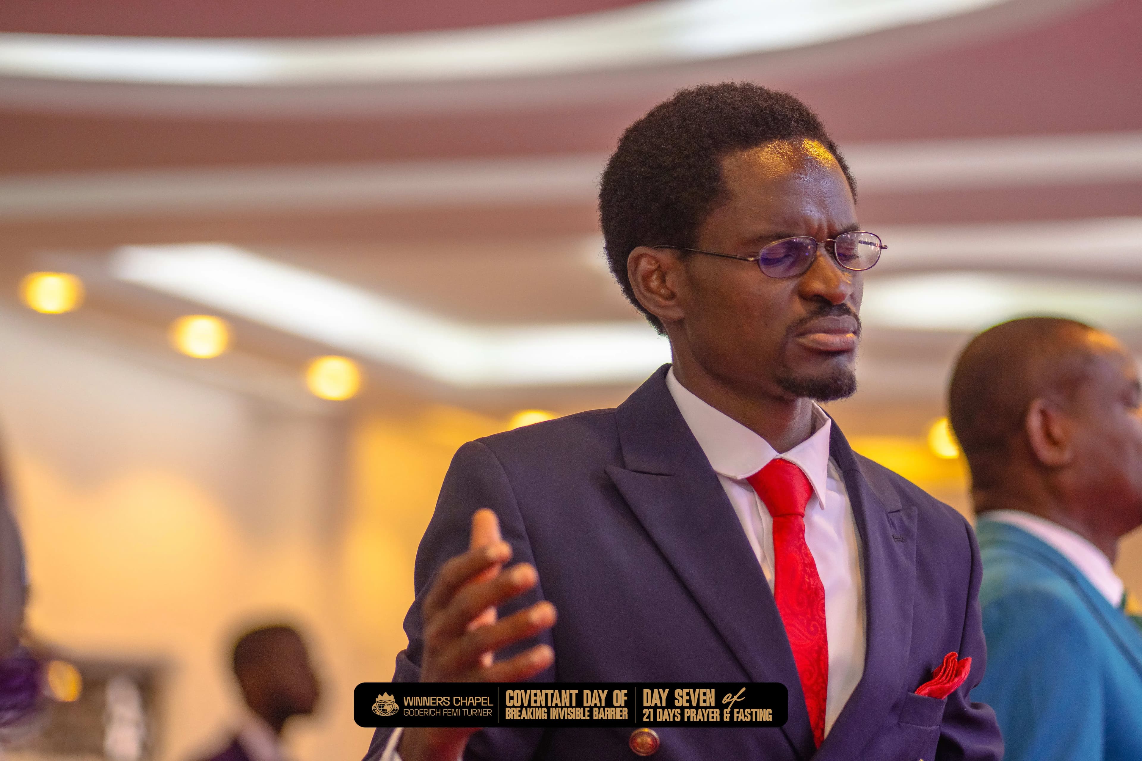 Pastor Sylvanus during worship