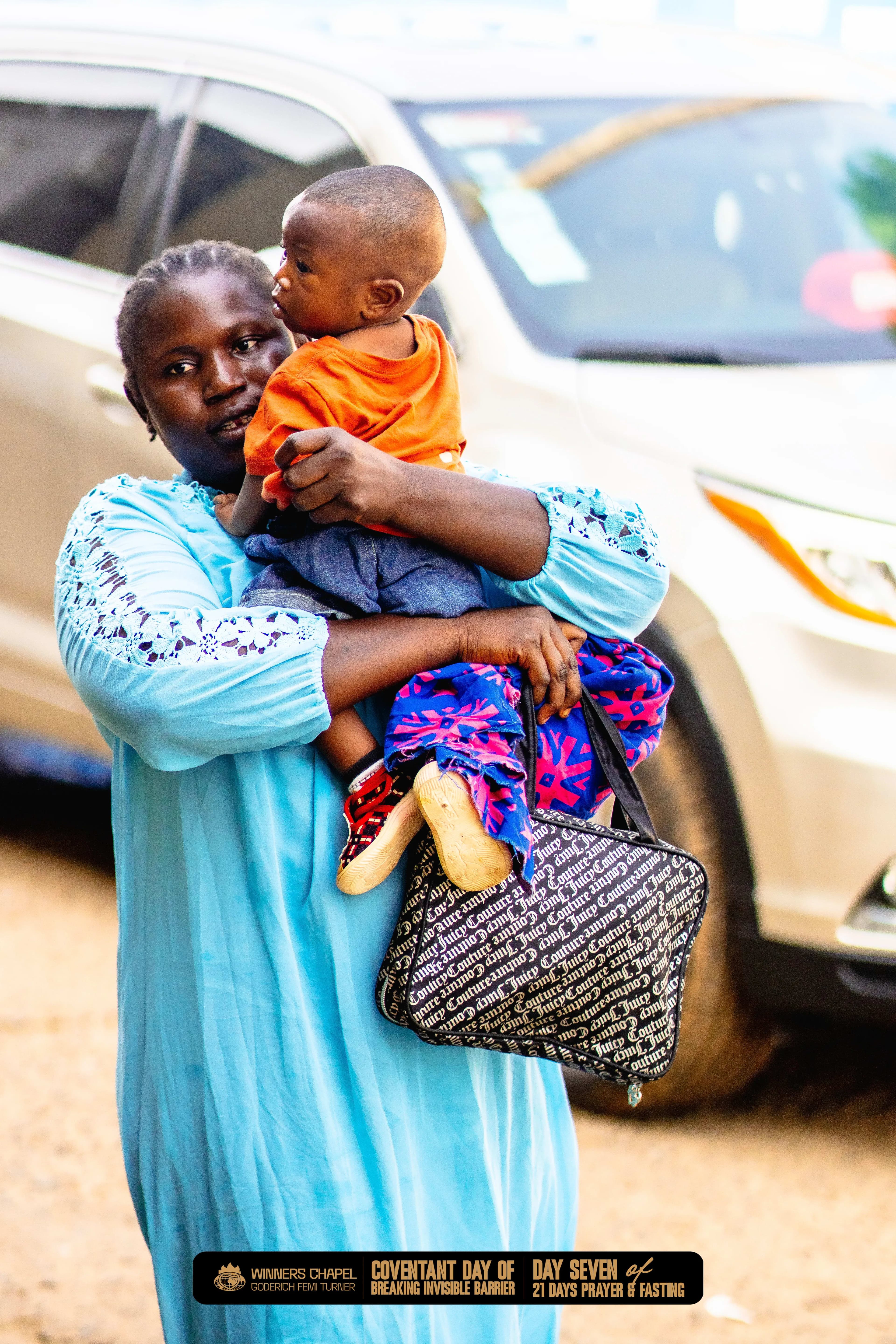 A mother and child coming in for service